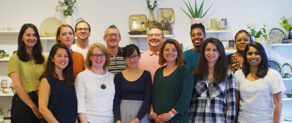 group of staff stand together